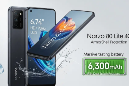 Realme Narzo 80 Lite 4G: Realme Narzo 80 Lite 4G स्मार्टफोन की एक विस्तृत छवि, जिसमें इसका बड़ा 6.74-इंच HD+ 90Hz LCD डिस्प्ले, IP54 धूल और स्प्लैश प्रतिरोध, आर्मरशेल प्रोटेक्शन, और एक विशाल 6,300mAh बैटरी दिखाई गई है। इसमें फोन का स्लीक, टिकाऊ डिज़ाइन भी प्रदर्शित किया गया है।